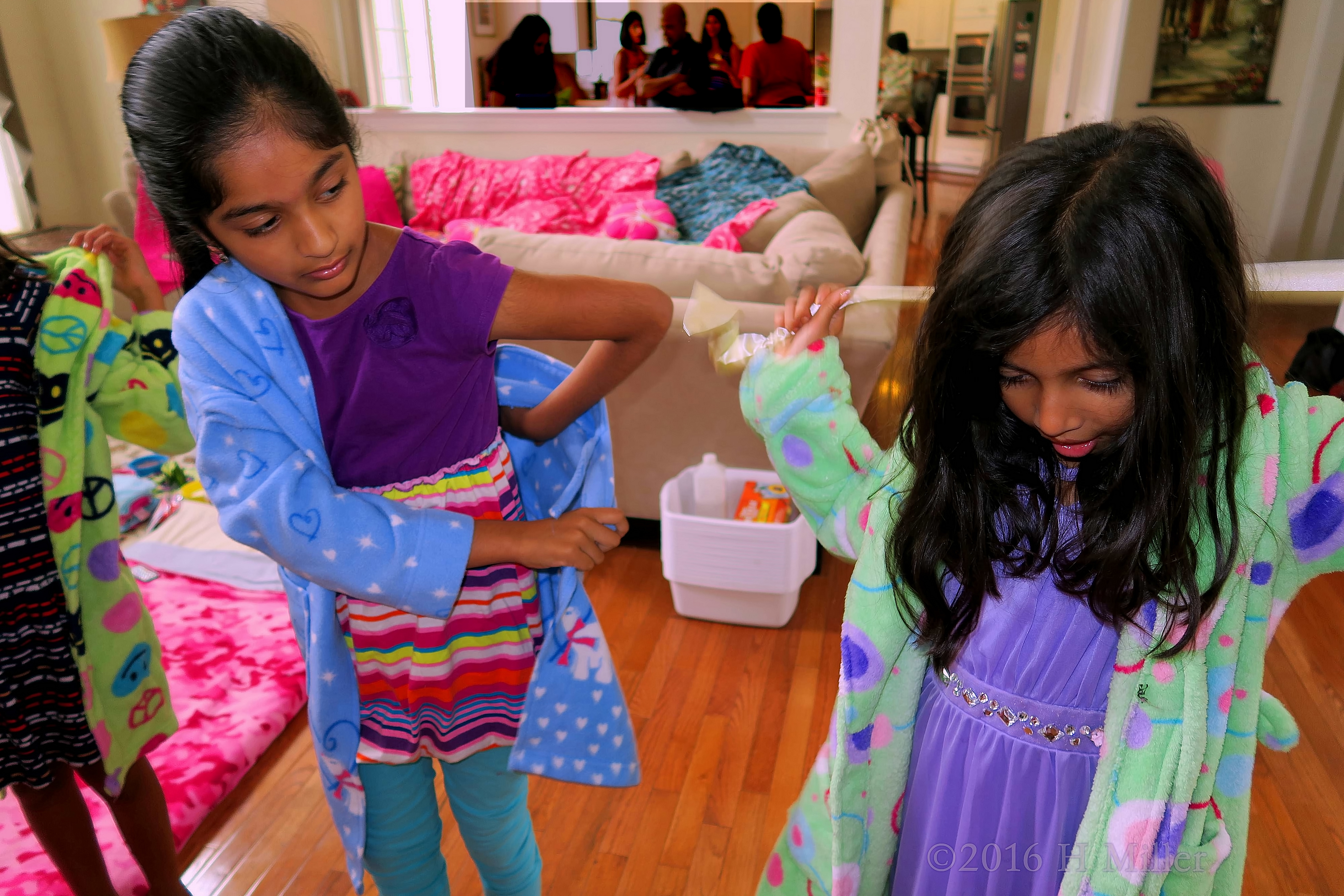 Putting On Cute Spa Robes For Girls. Putting On Cute Spa Robes For Girls.