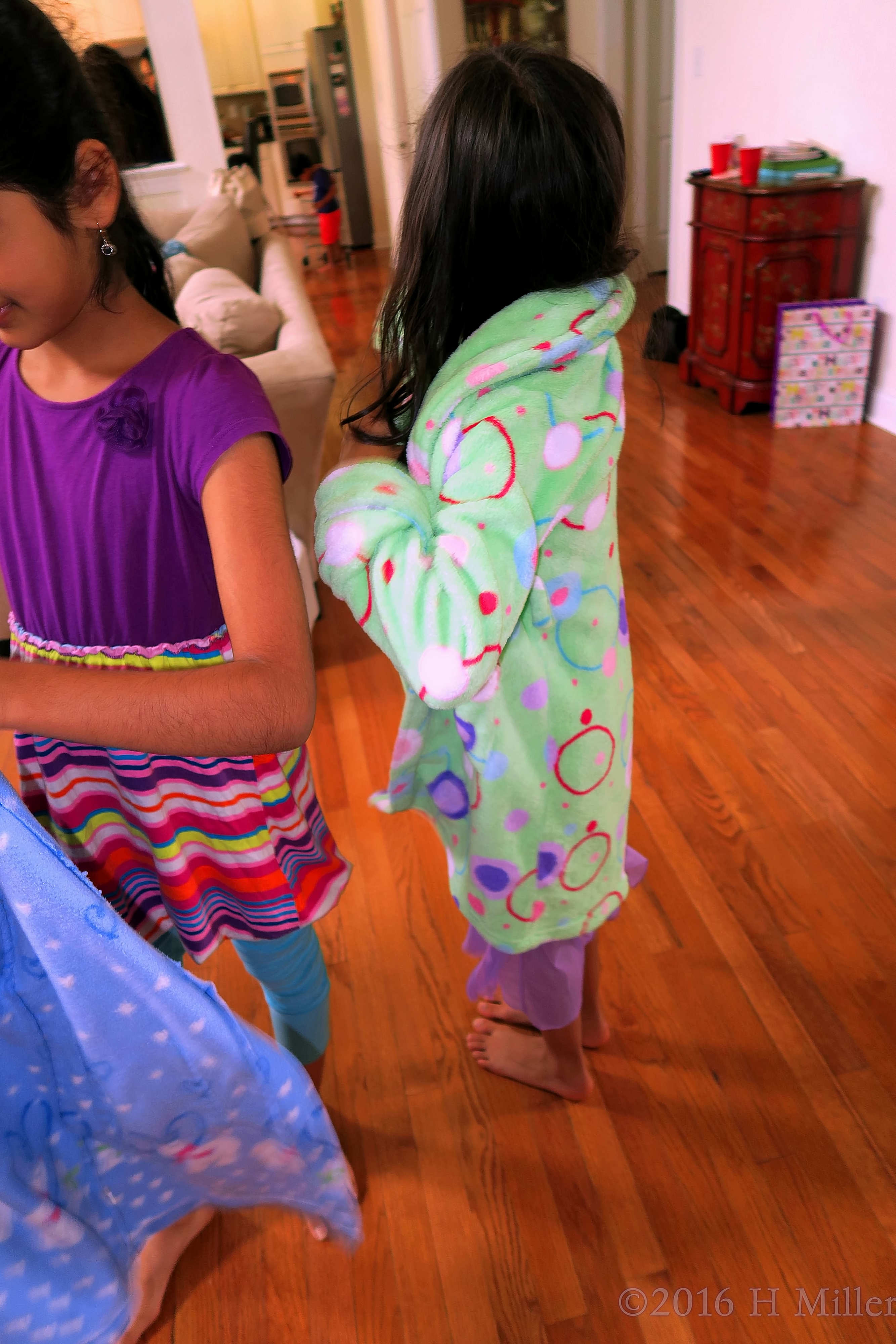 Putting On Their Spa Robes Putting On Their Spa Robes