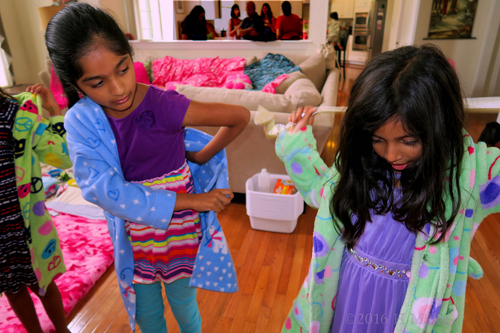 Putting On Cute Spa Robes For Girls. Putting On Cute Spa Robes For Girls.