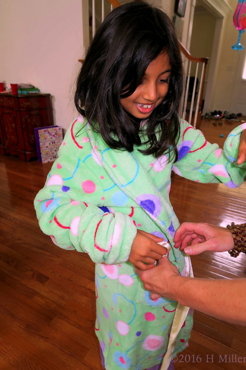 Tying Her Spa Robe Sash