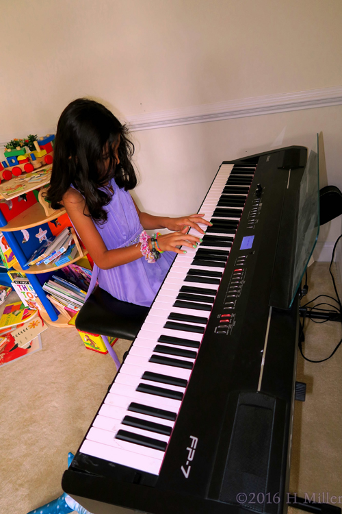 Playing Piano At The Kids Party Playing Piano At The Kids Party