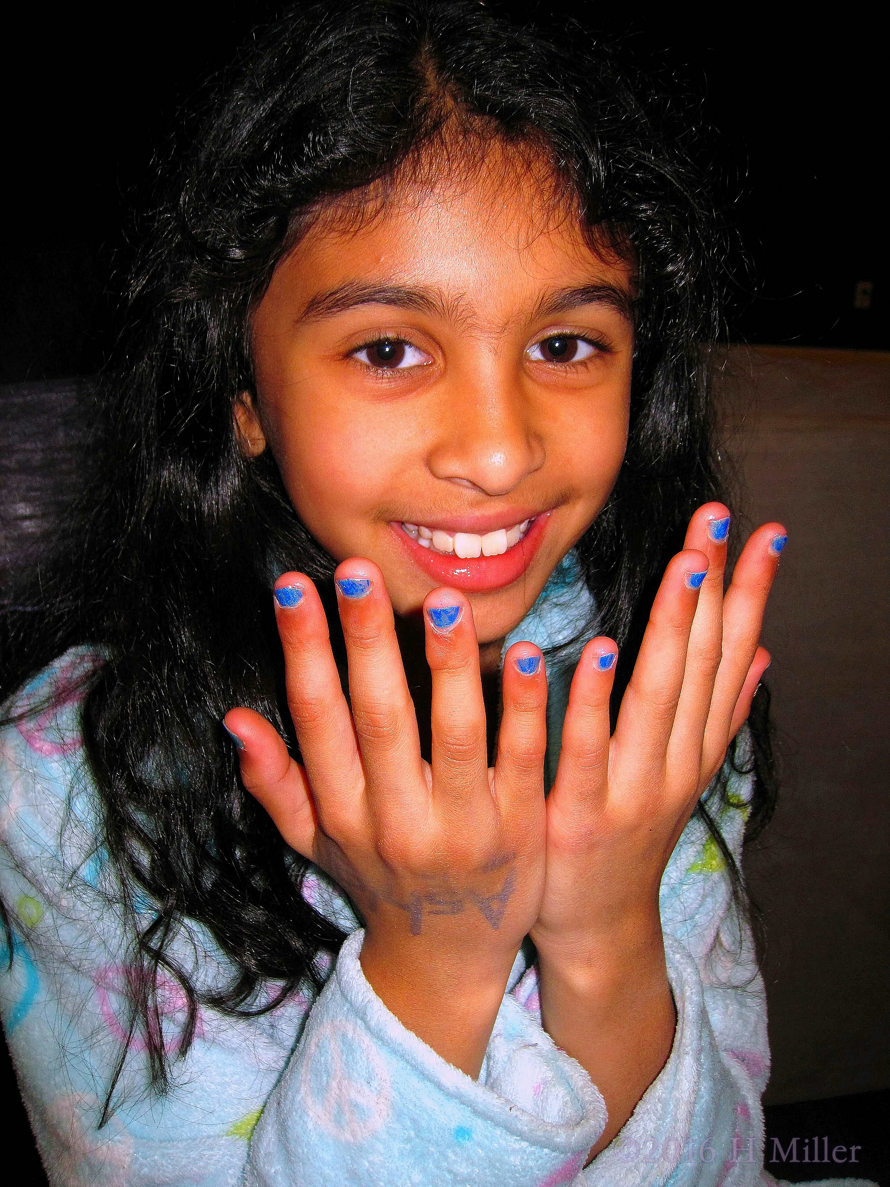 Ashley Smiling With Her New Electic Blue Mani!! 