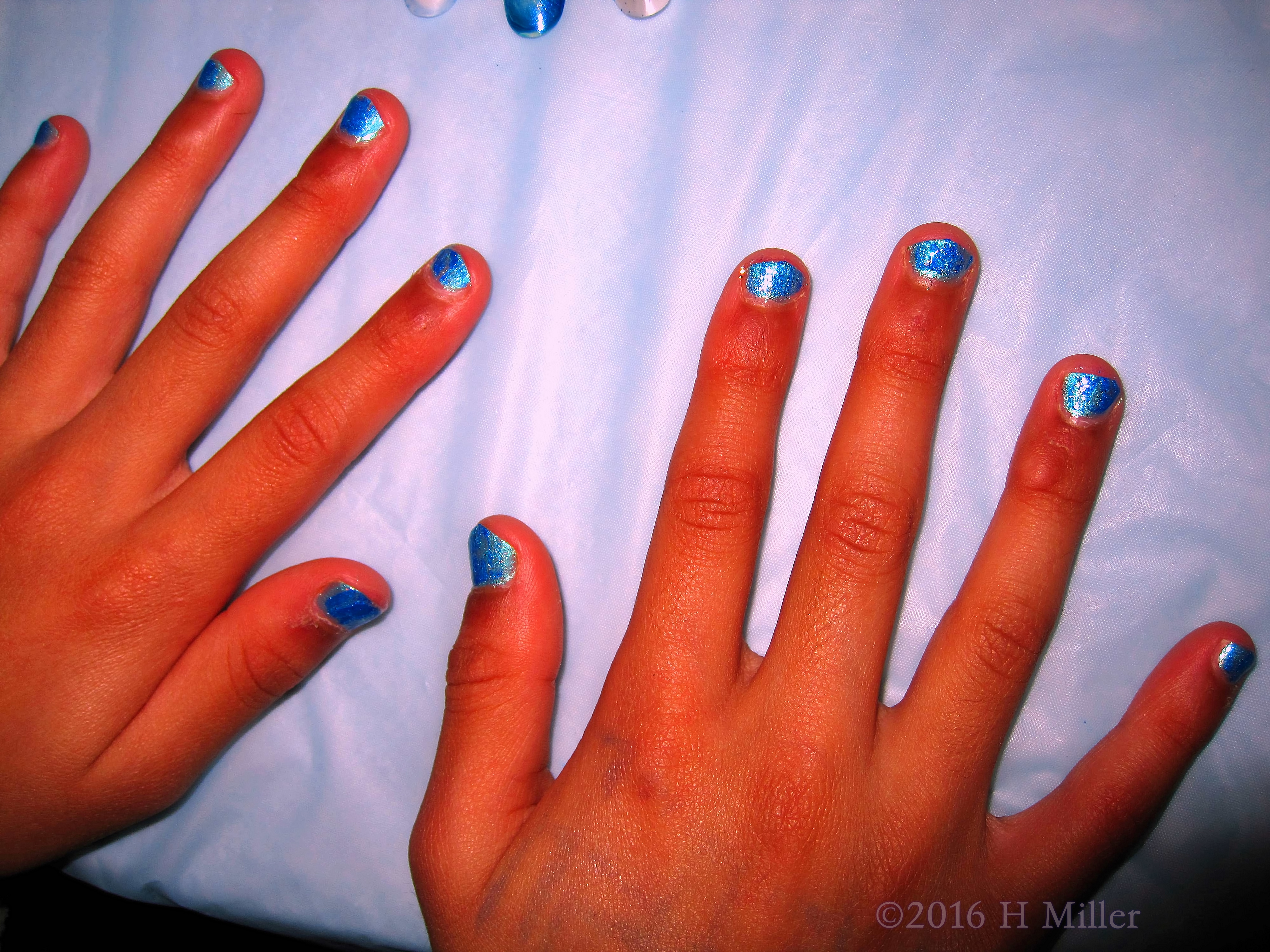 Metallic Blue Mani With Glitter Top Caot. Metallic Blue Mani With Glitter Top Caot.