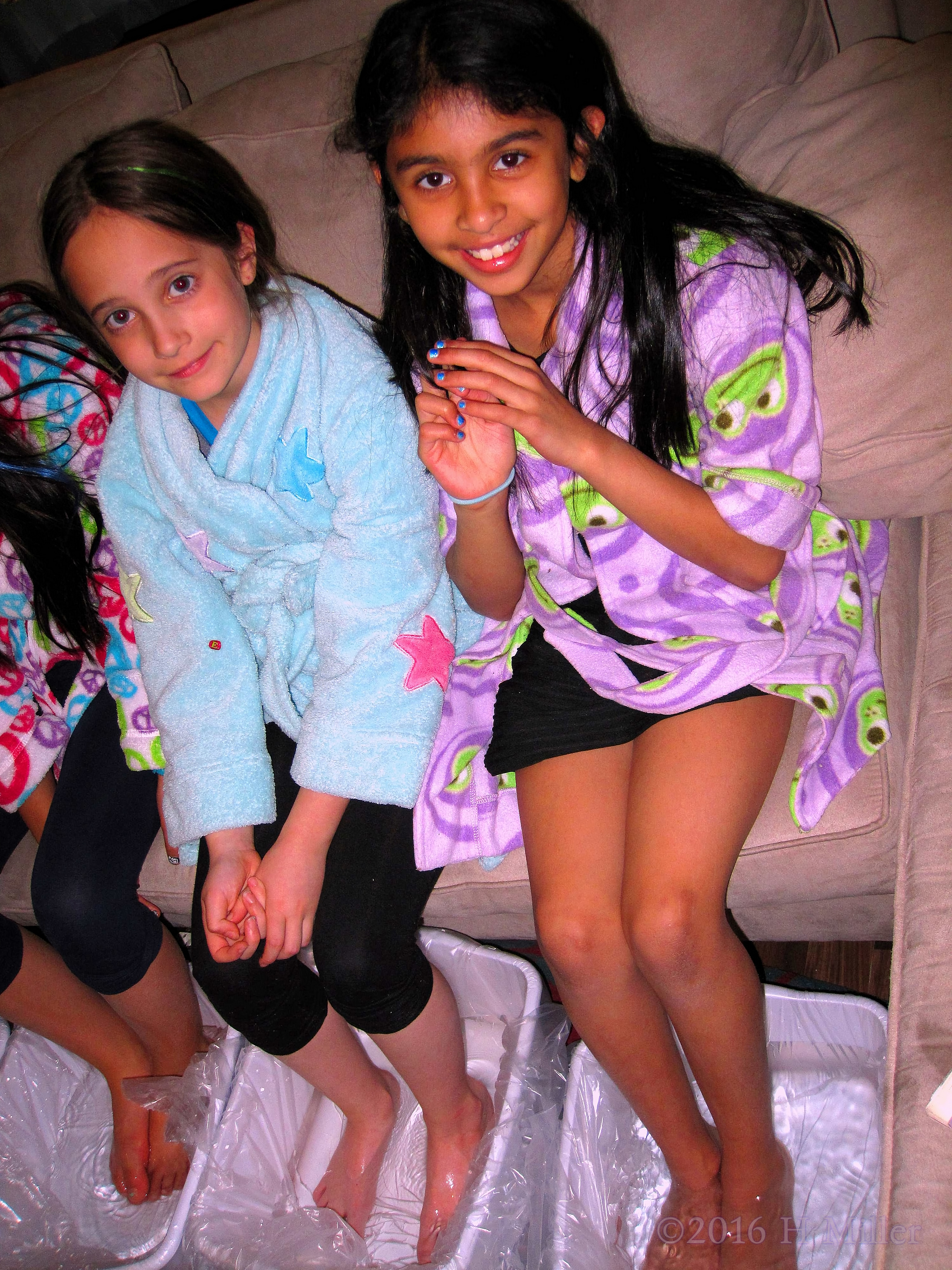 Having Fun Unwinding With Friends, Ashley Smiles For A Pic During The Spa Party Foot Bath In Warm Water. Having Fun Unwinding With Friends, Ashley Smiles For A Pic During The Spa Party Foot Bath In Warm Water.