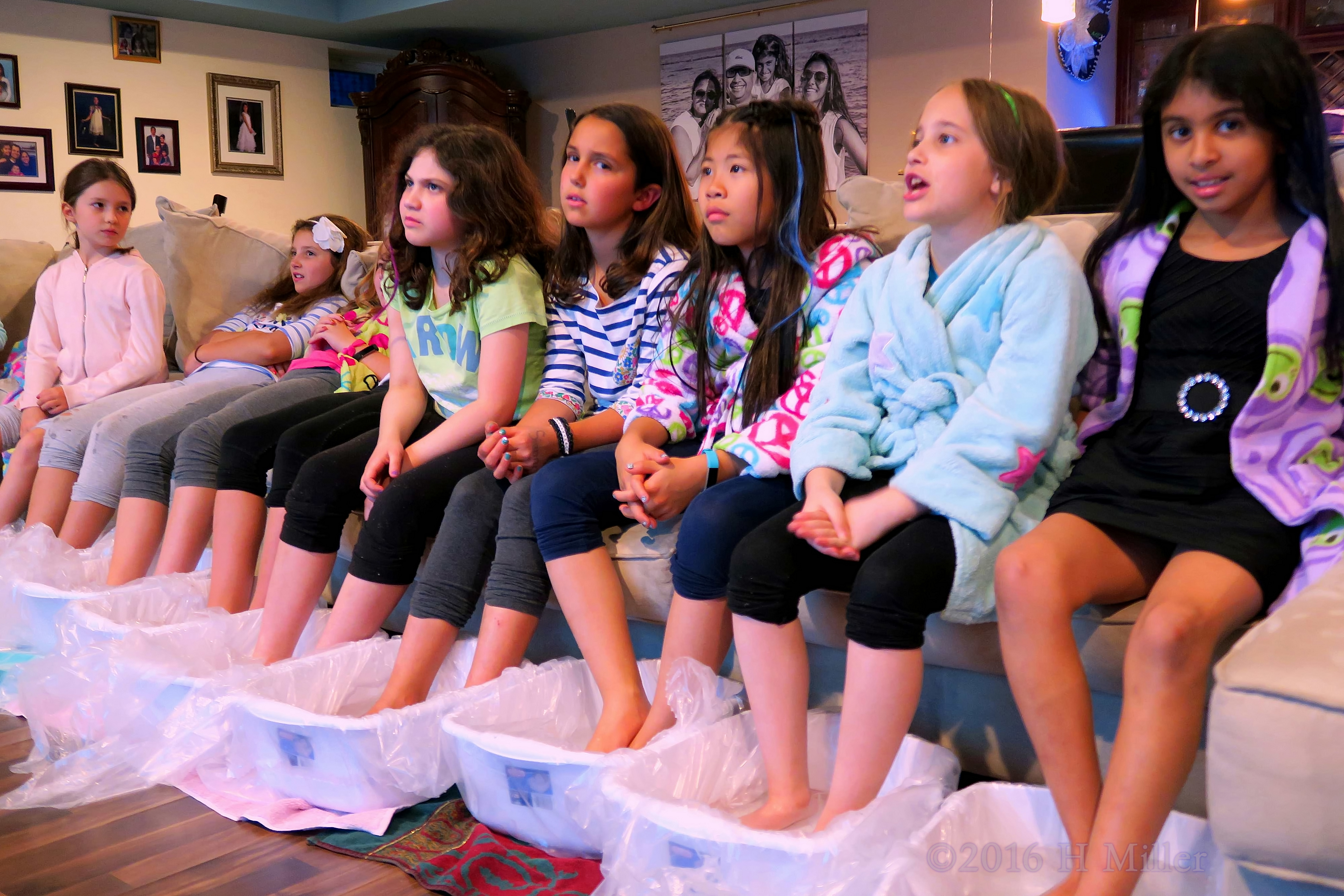 Watching TV As THeir Feet Soak In The Warmth. 