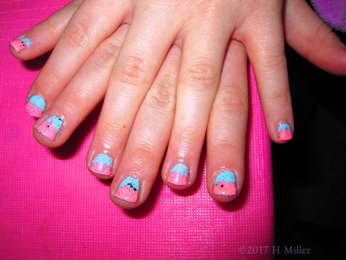 A Closer View Of The Blue And Pink Sparkly Ombre Nail Design. 