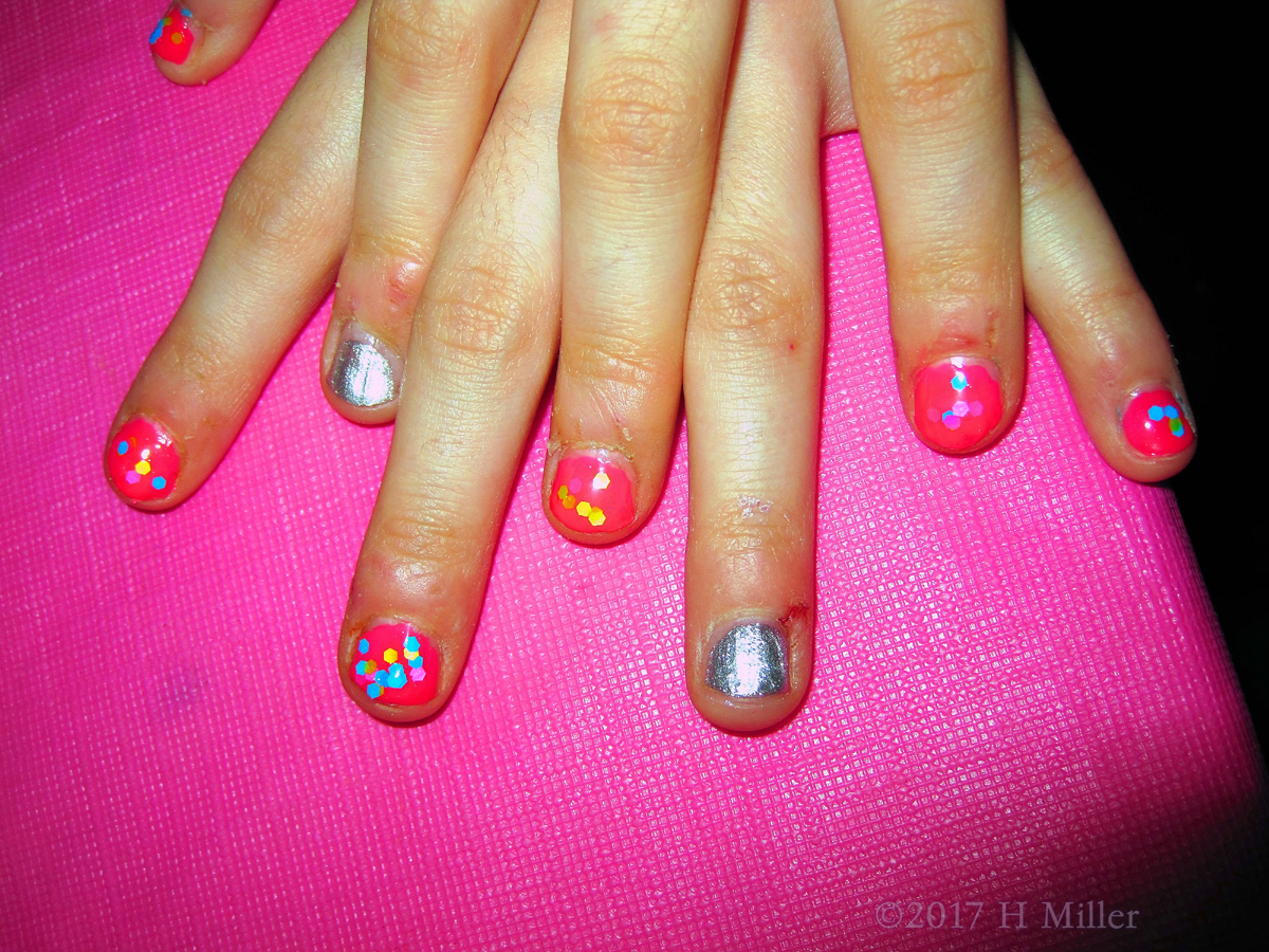 Mini Mani With Multi Colored Dots On Pink And Silver Polish. 