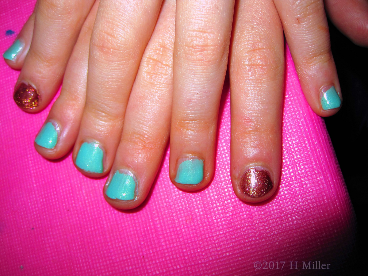 Sparkly Red Glitter And Light Blue Nail Polish For This Girls Manicure! 