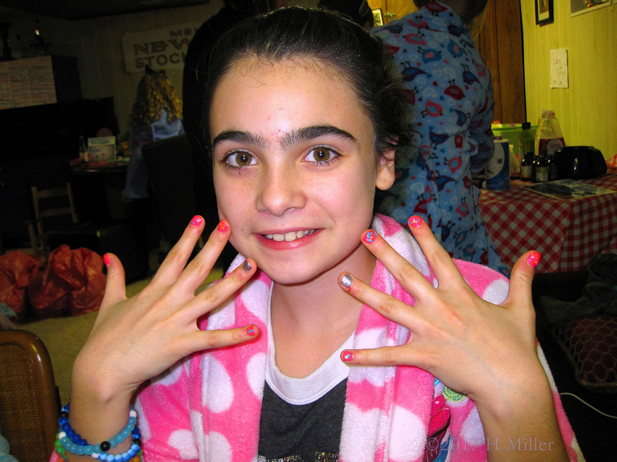 The Birthday Girl Smiles With Her New Girls Manicure. 