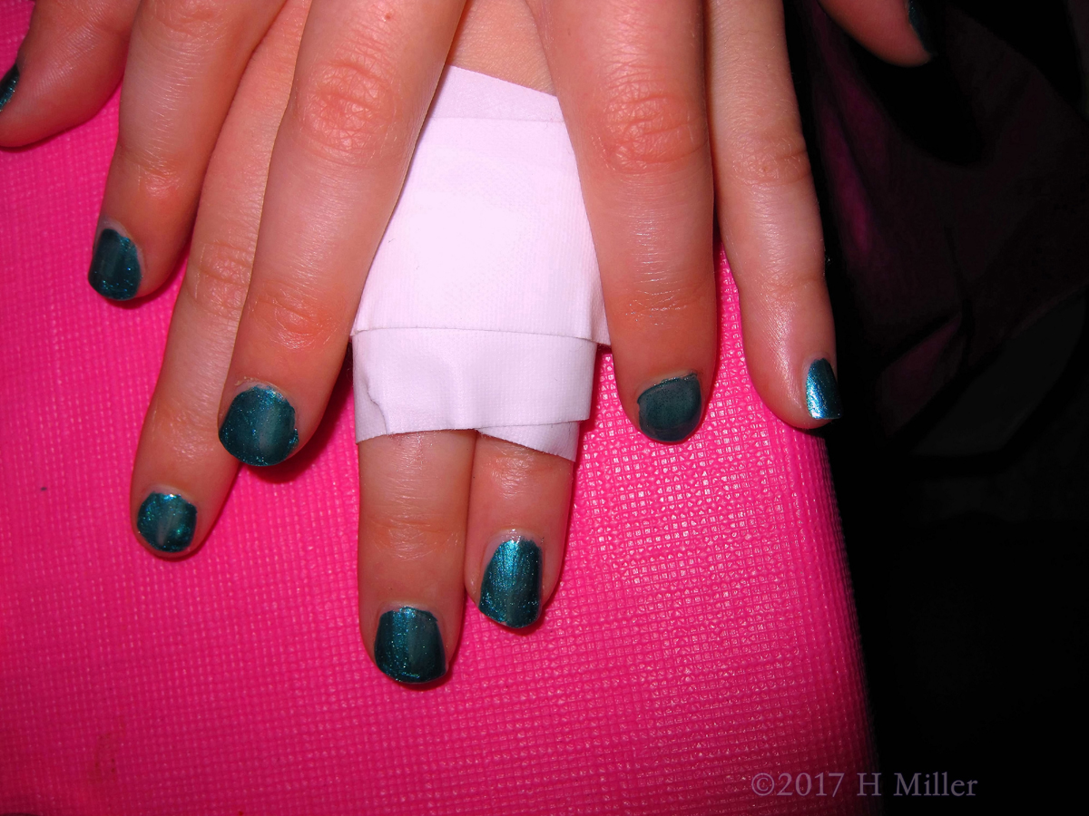 What A Lovely Shade Of Metallic Blue For Her Mini Mani! 