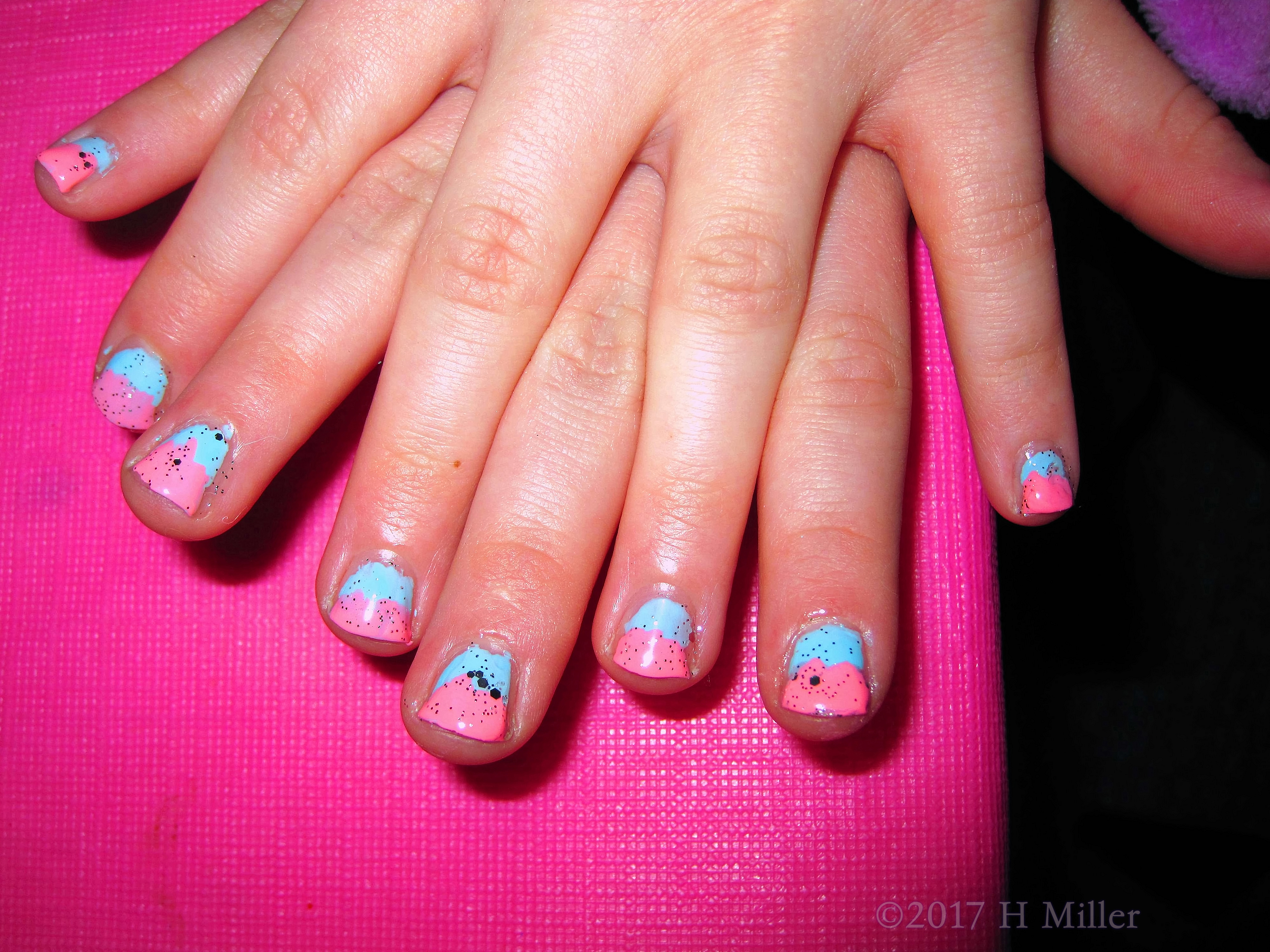 A Closer View Of The Blue And Pink Sparkly Ombre Nail Design. A Closer View Of The Blue And Pink Sparkly Ombre Nail Design.