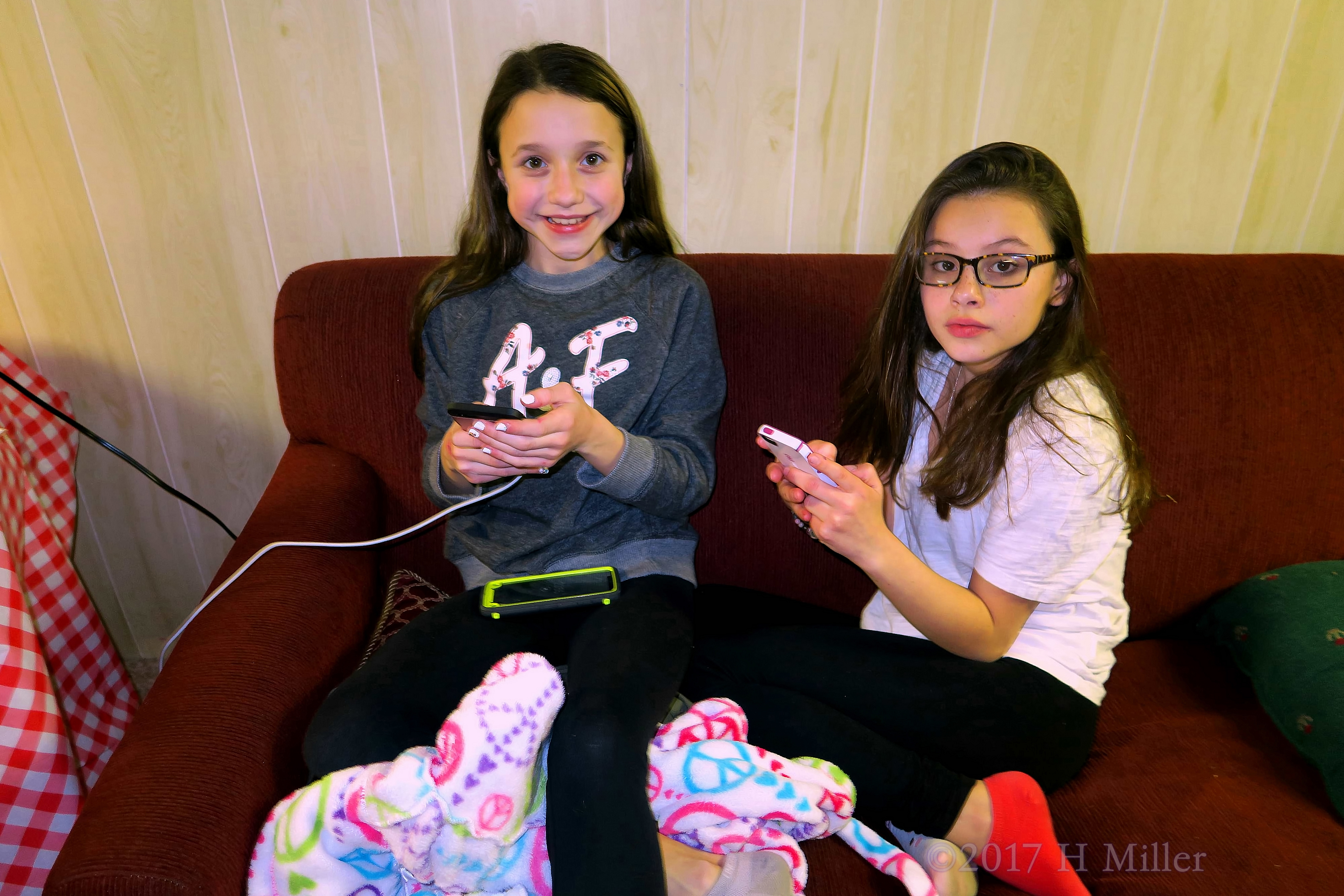 Playing With Their Phones During An Activities Break At The Spa. 4 Playing With Their Phones During An Activities Break At The Spa. 4