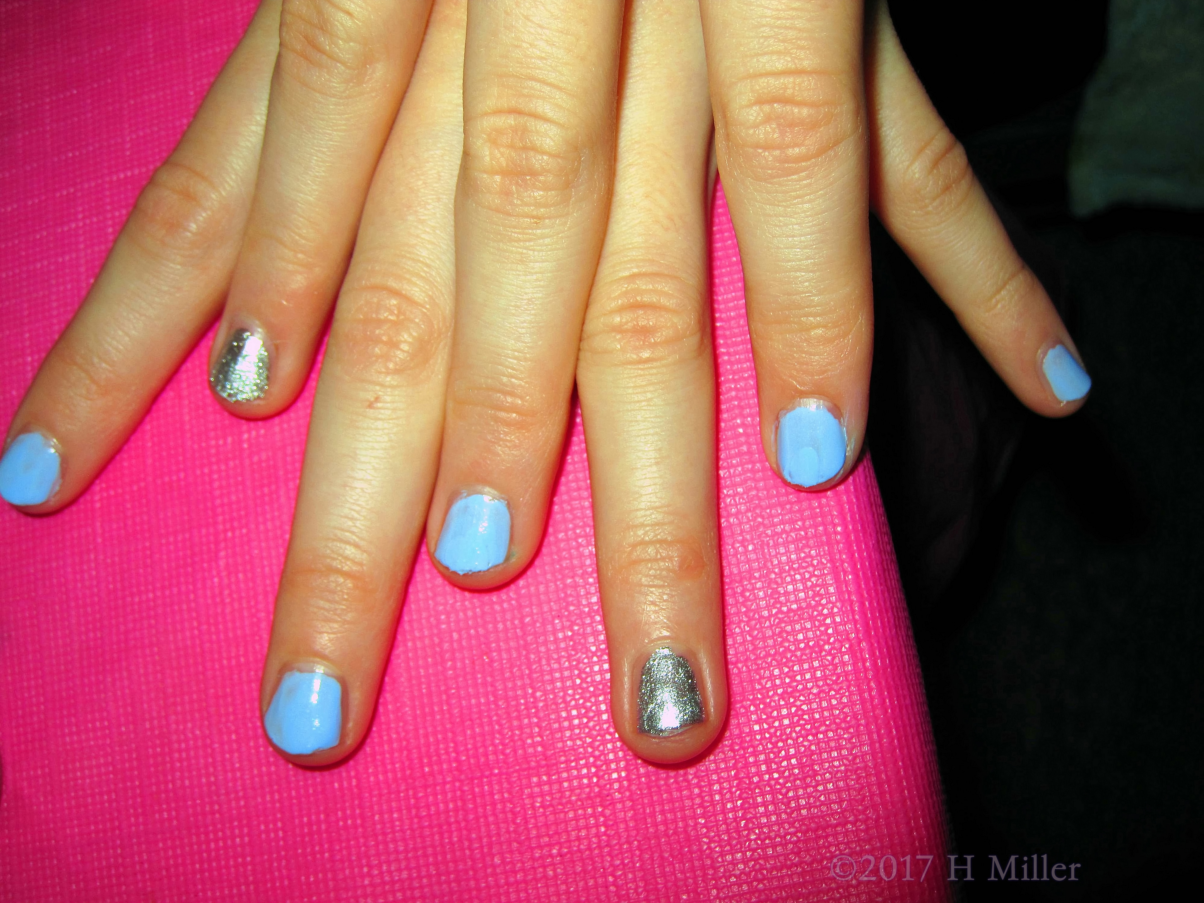 What A Pretty Mini Manicure With Blue And Silver Polish! 