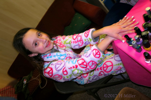 Getting Her Nails Painted At The Kids Spa.