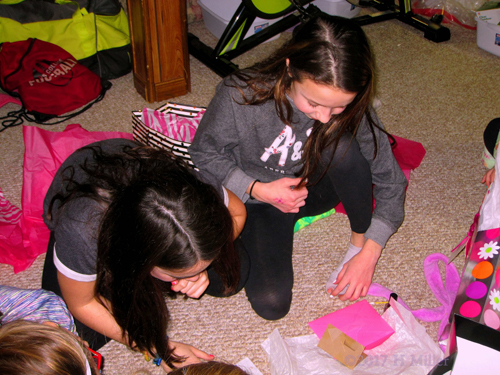 Opening More Gifts At The Kids Birthday Party. 