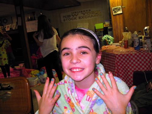 Smiling With Her New Mini Manicure.