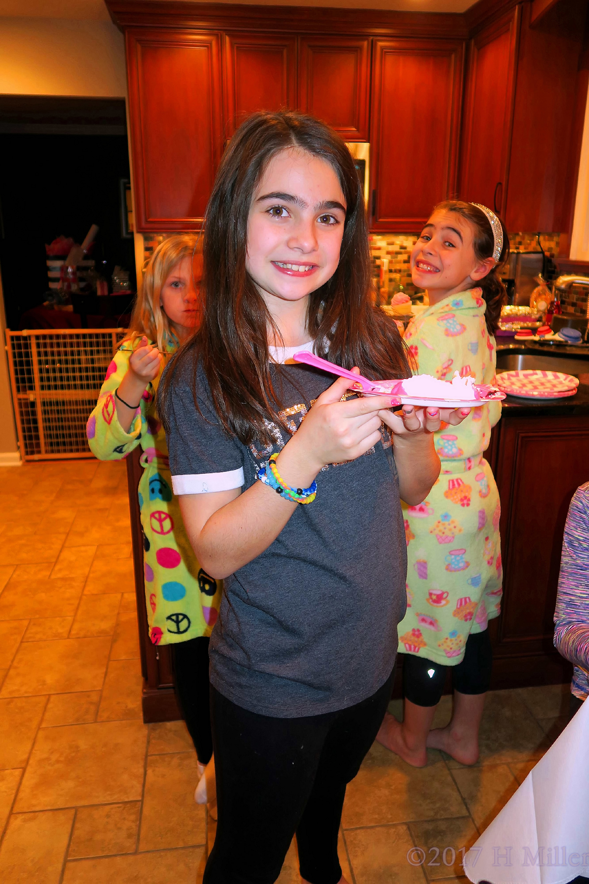 Audrey Smiles While Enjoying Her Spa Birthday Cake. 