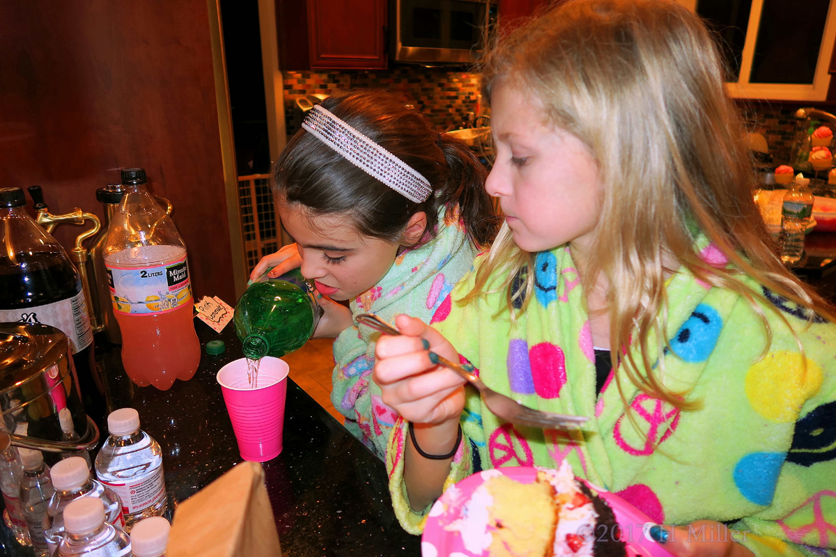 Eating Cake And Pouring Soda At The Kids Party. 