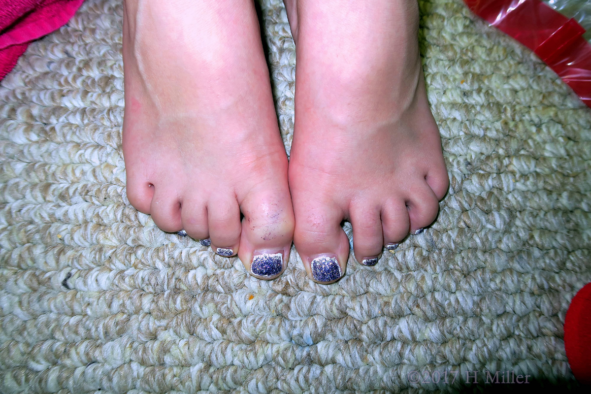 Kids Pedicure For The Birthday Girl With Purple Glitter And White Polish. 1