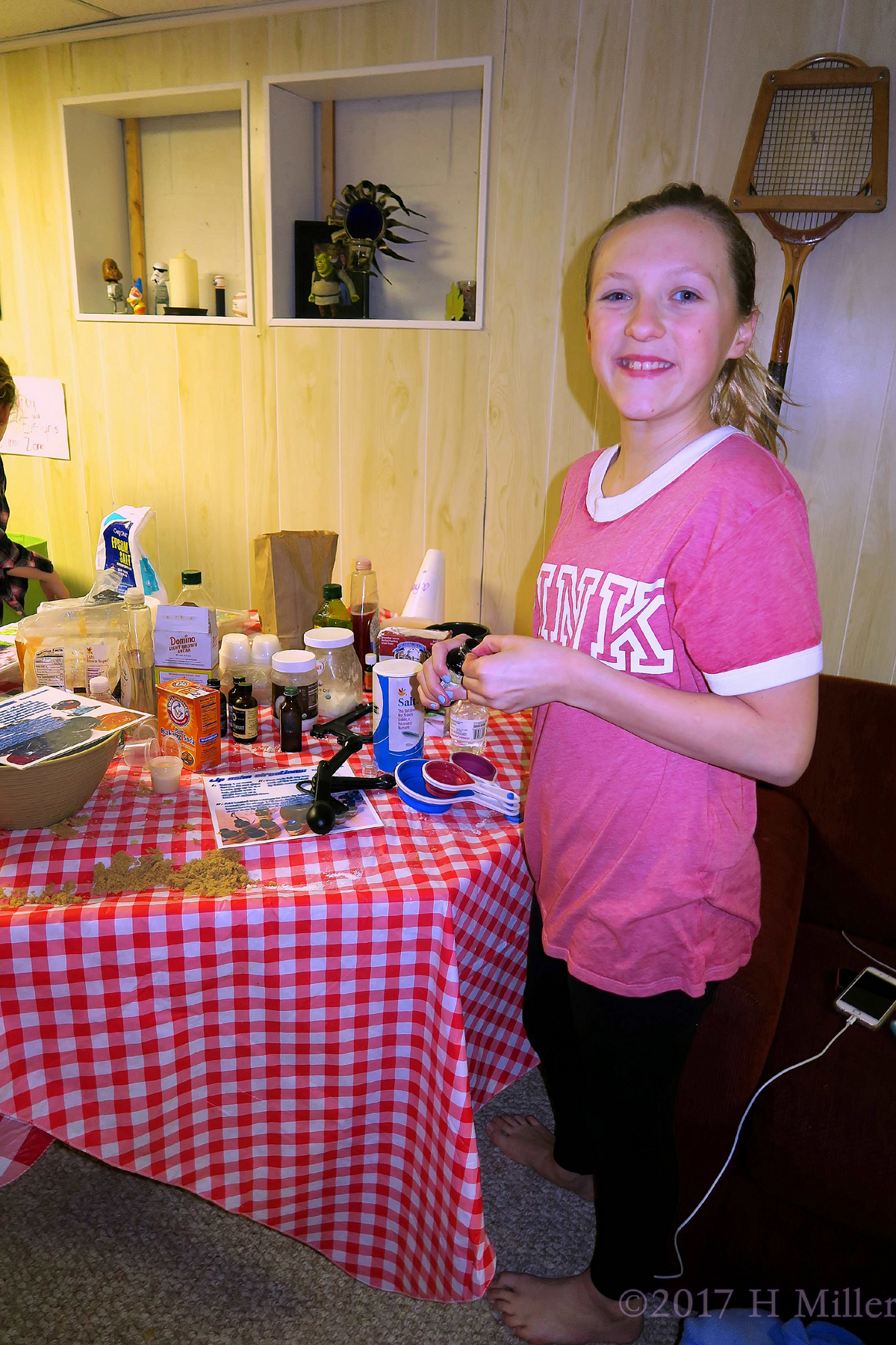 She Is Making The Flavored Lip Balm Craft At The Girls Spa! 