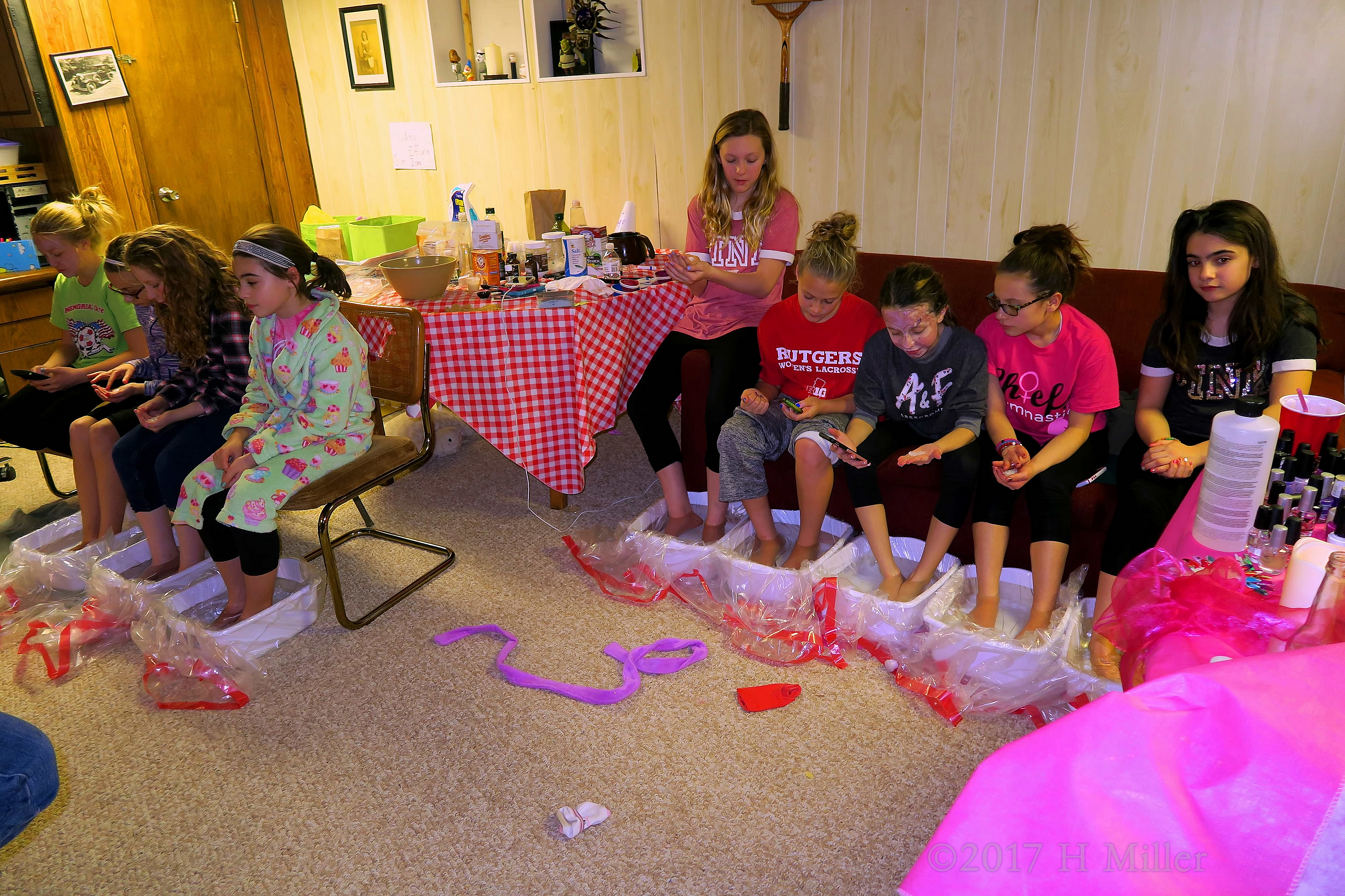 A Long View Of Everyone Sitting Together For Their Kids Pedicures! 4