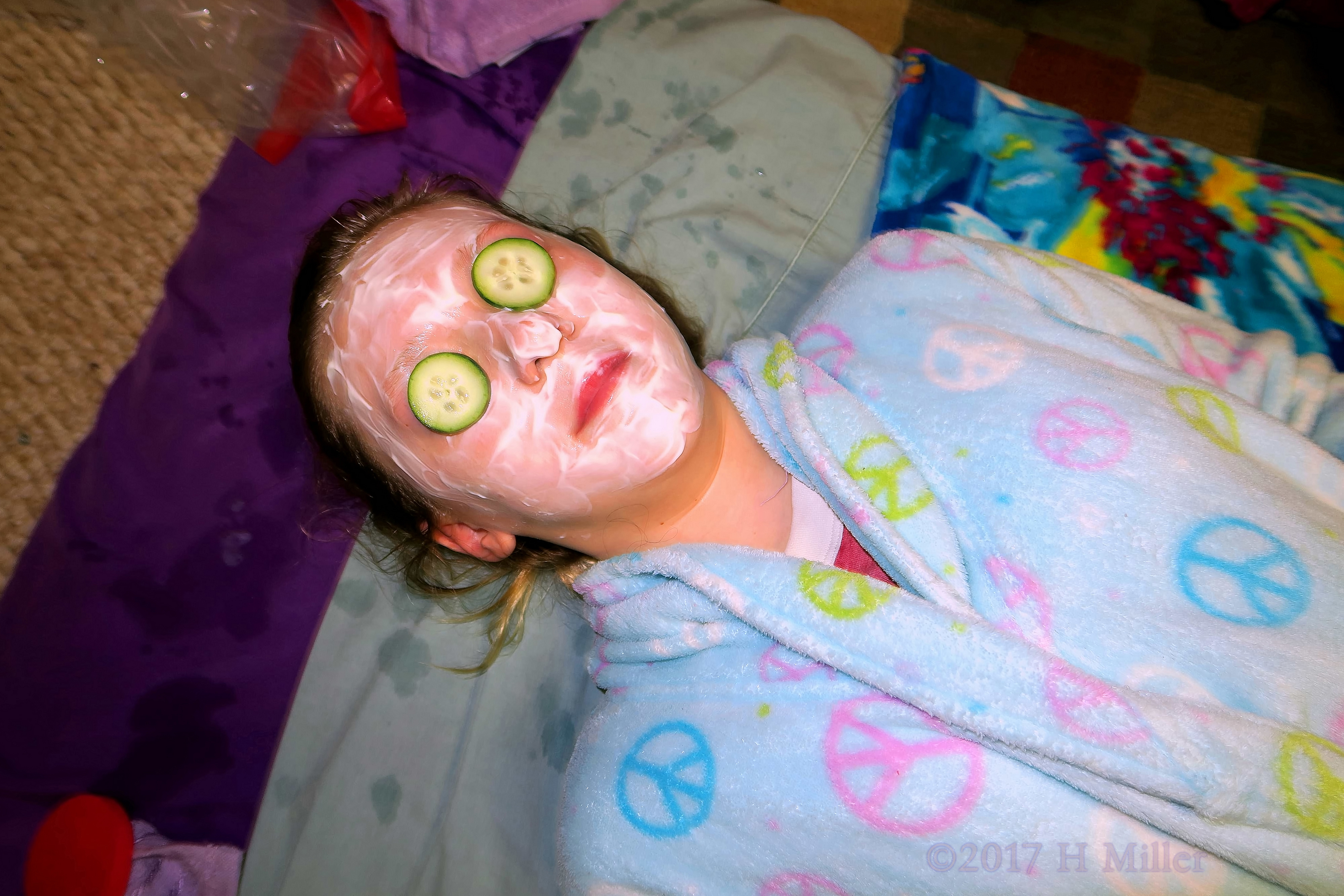 Realxing During The Facials For Girls Spa Activity. 