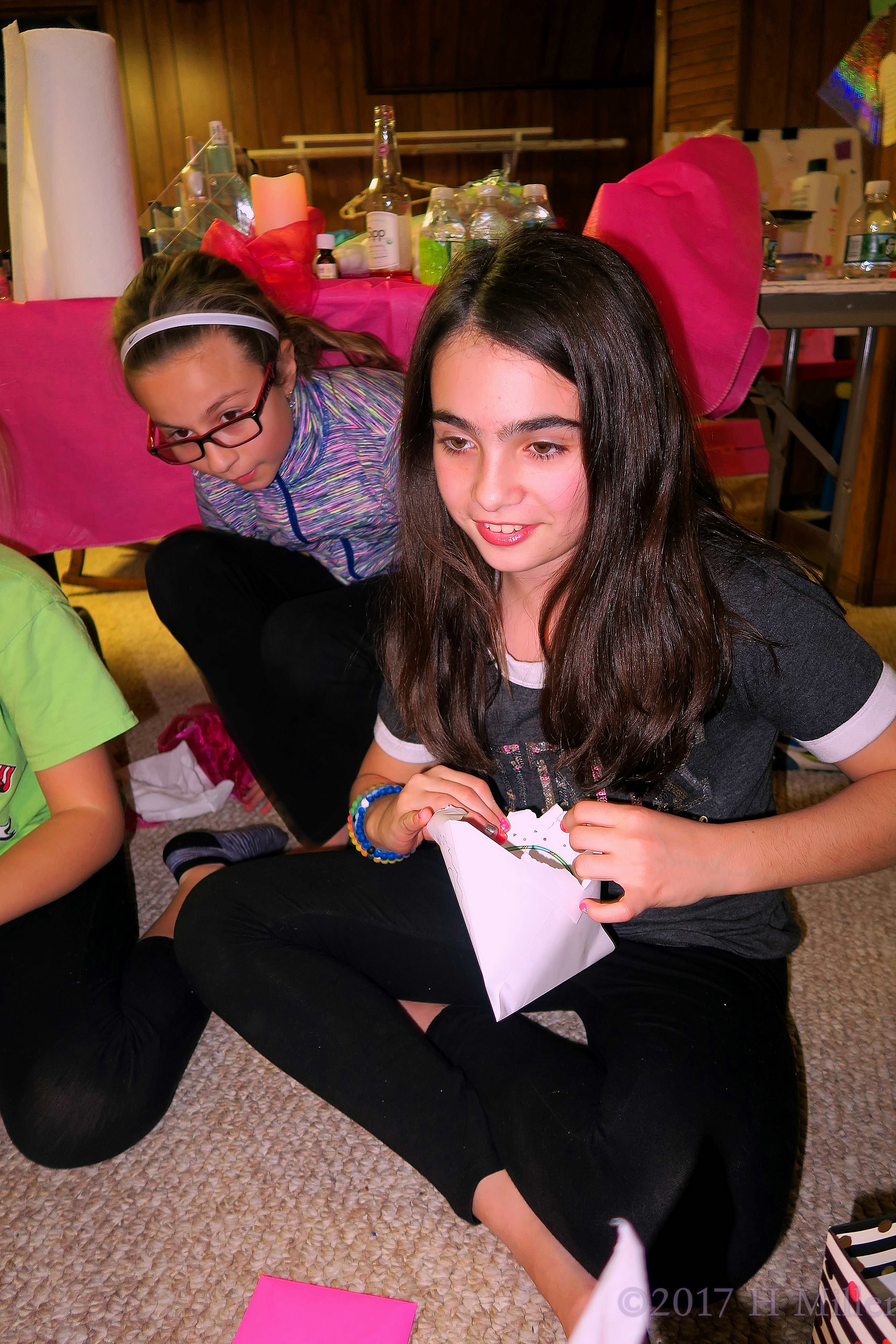 She Is Opening The Next Birthday Card. 4 She Is Opening The Next Birthday Card. 4