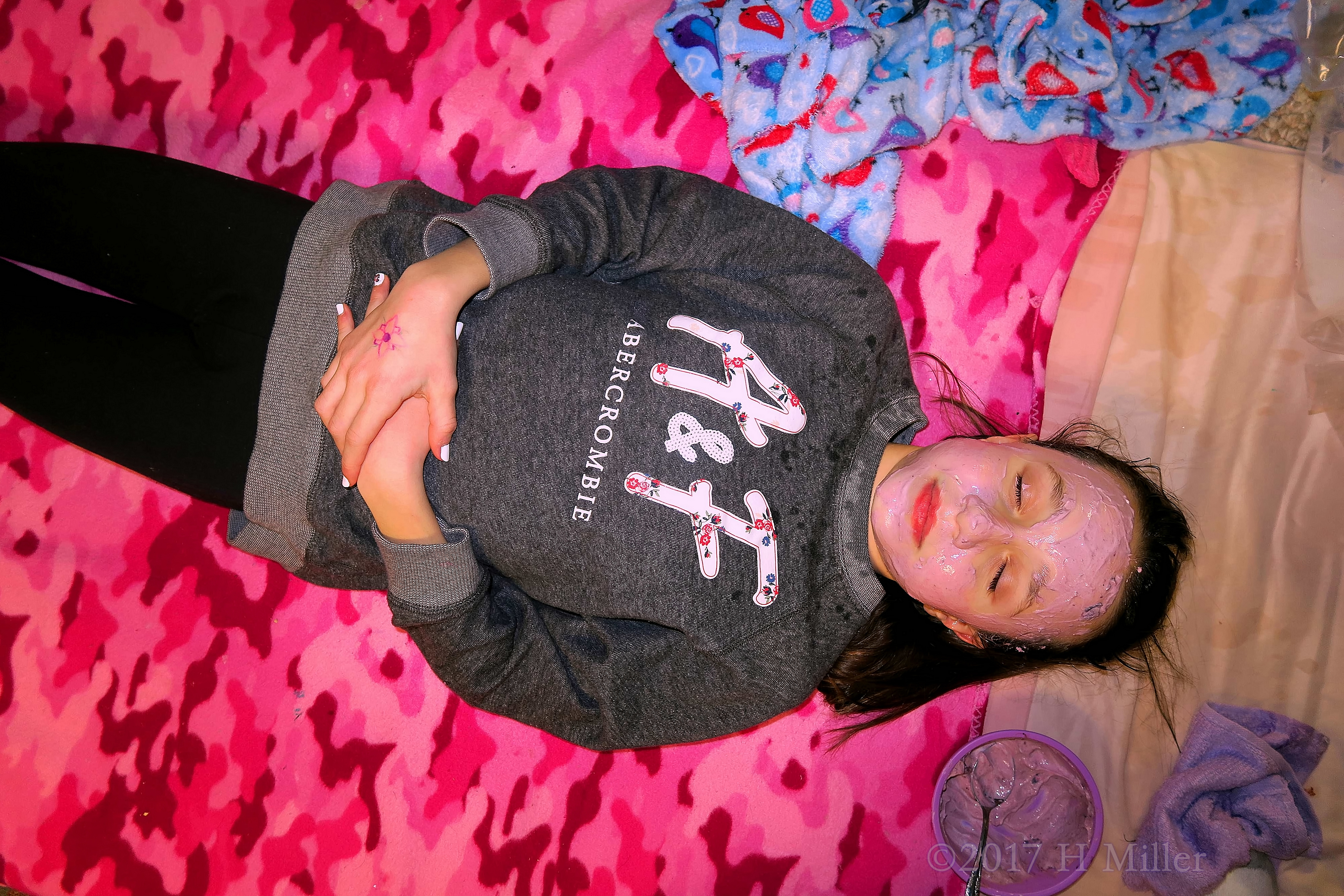 She Is Relaxing During Kids Facials At The Girls Spa. She Is Relaxing During Kids Facials At The Girls Spa.