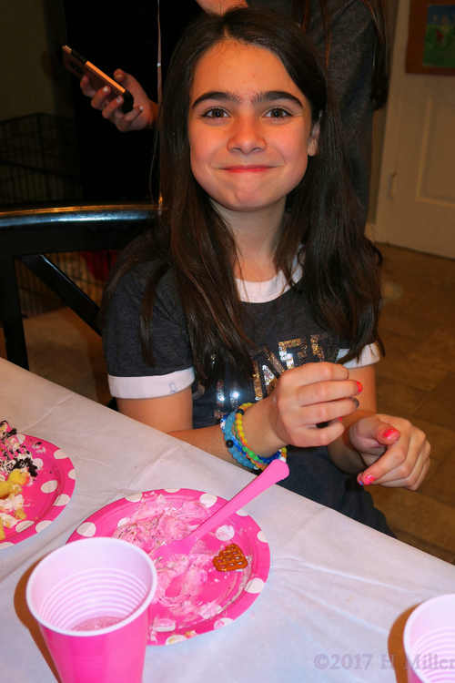 Audrey Pauses For A Picture At The Cake Table.