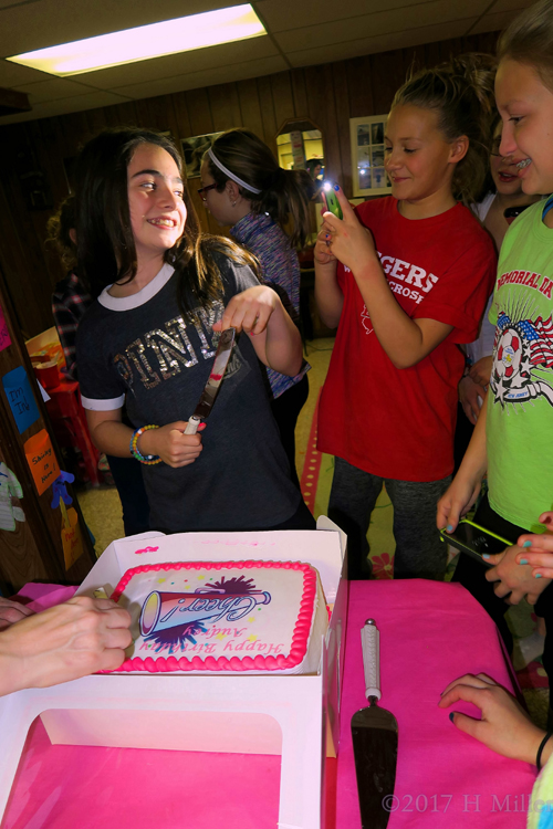 Audrey Poses For A Picture Next To Her Spa Birthday Cake. Audrey Poses For A Picture Next To Her Spa Birthday Cake.
