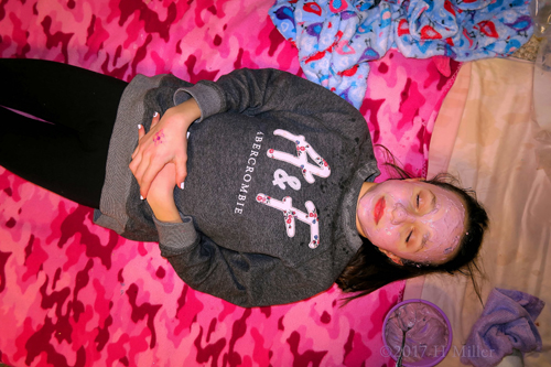 She Is Relaxing During Kids Facials At The Girls Spa. She Is Relaxing During Kids Facials At The Girls Spa.