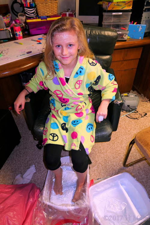 Smiling And Enjoying Her Kids Pedicure Footbath. 