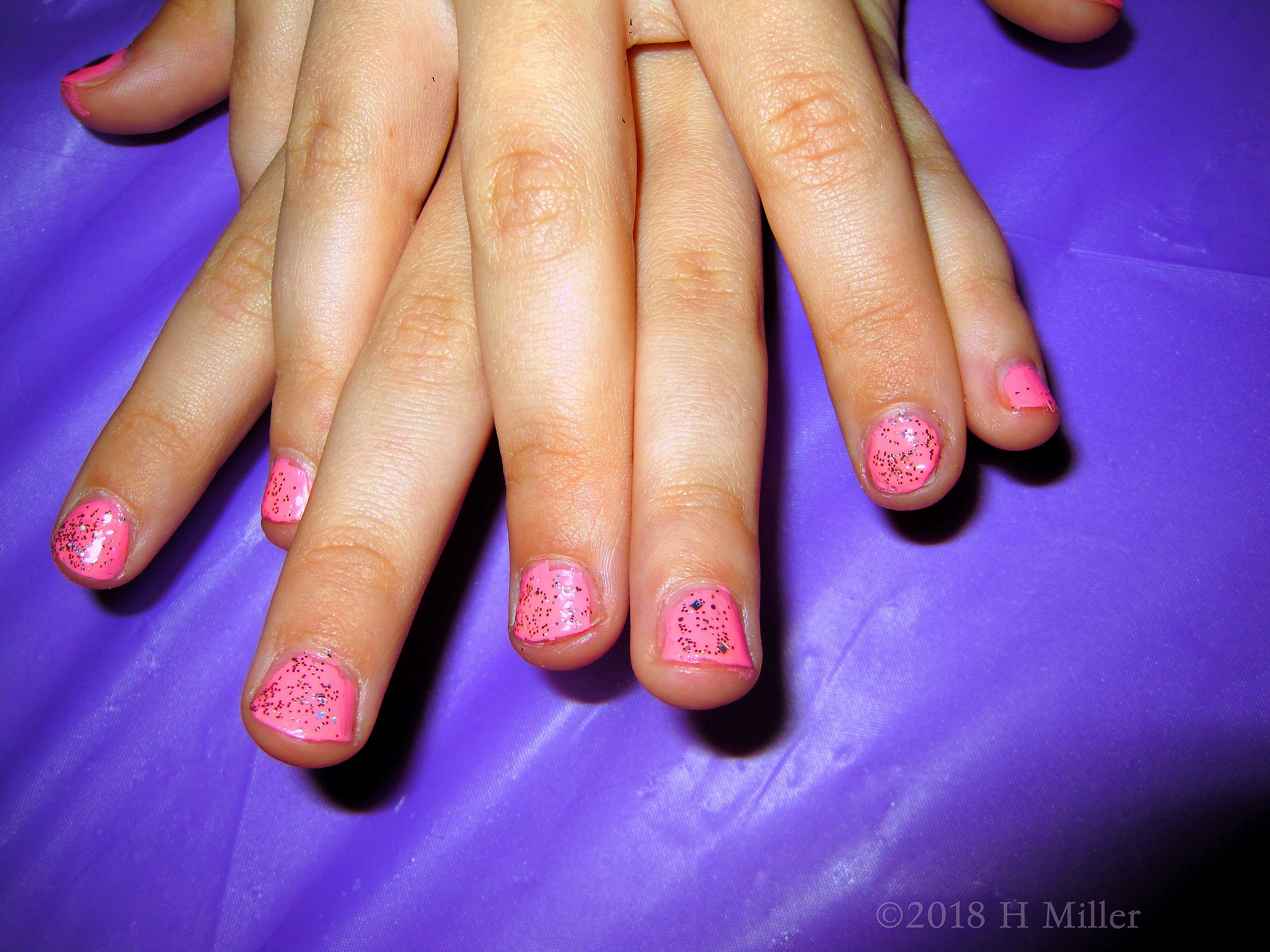 A Pretty Glittery Pink Girls Mani. A Pretty Glittery Pink Girls Mani.