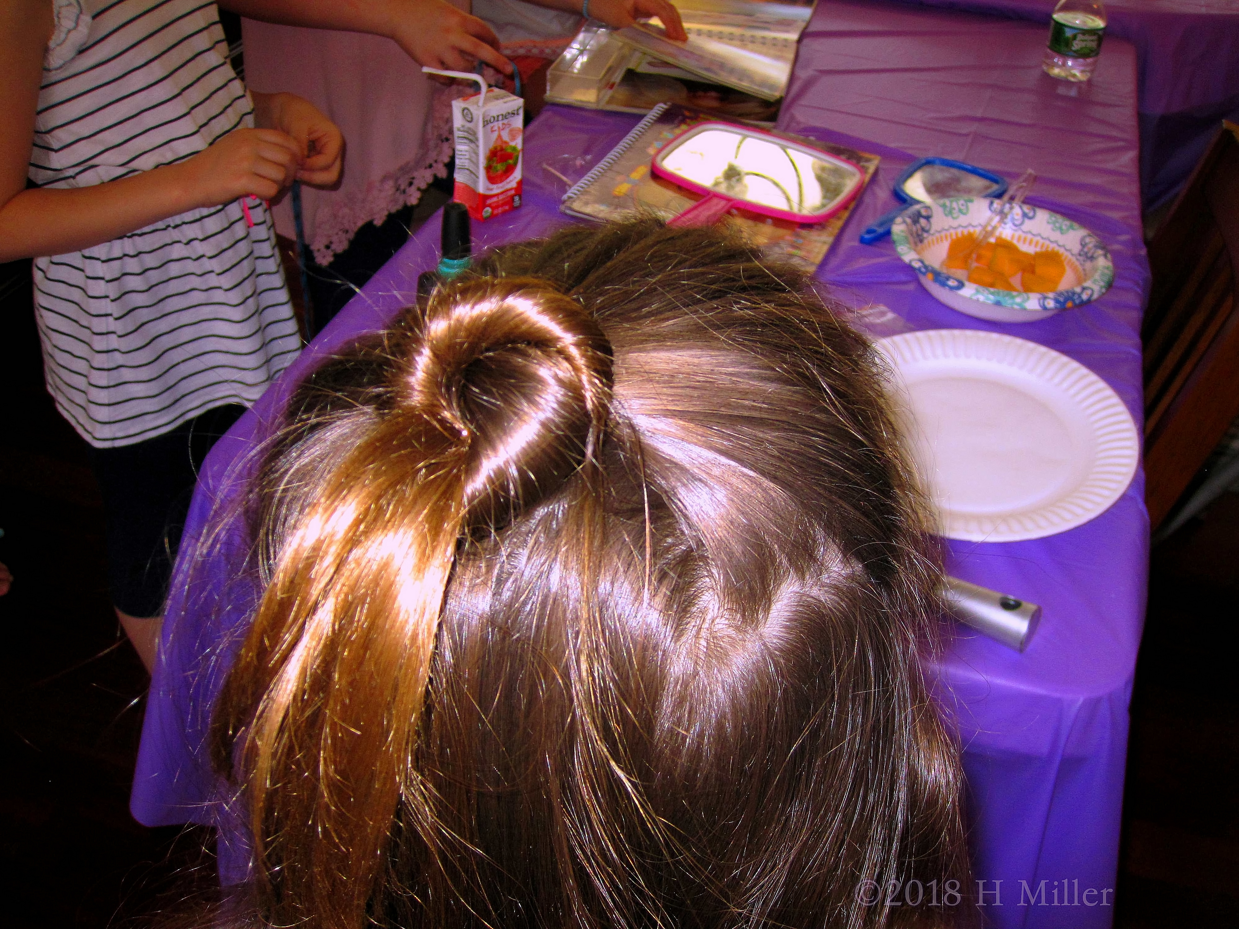 A Pretty Pollyanna Knot Kids Hairstyle. A Pretty Pollyanna Knot Kids Hairstyle.