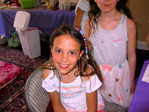 Big Smiles After Her Beaded Girls Hairstyle. Big Smiles After Her Beaded Girls Hairstyle.