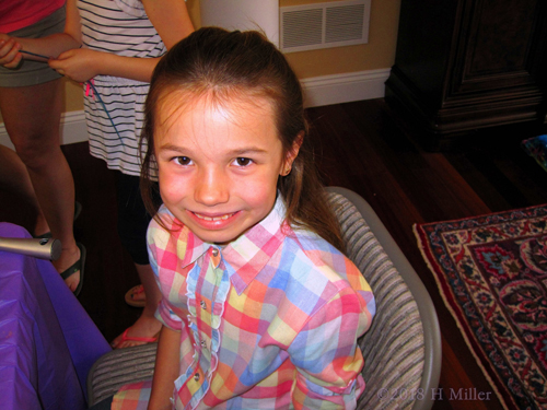 Smiling During Her Girls Hairstyle. Smiling During Her Girls Hairstyle.