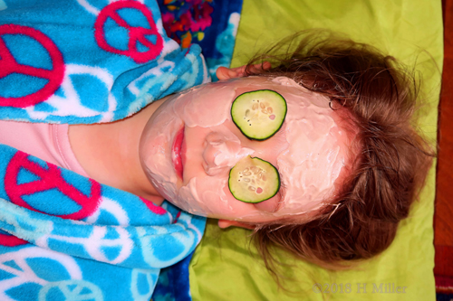 Cukes On Her Eyes During Kids Facials!
