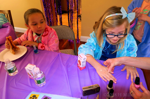Getting Her Girls Manicure Painted. Getting Her Girls Manicure Painted.