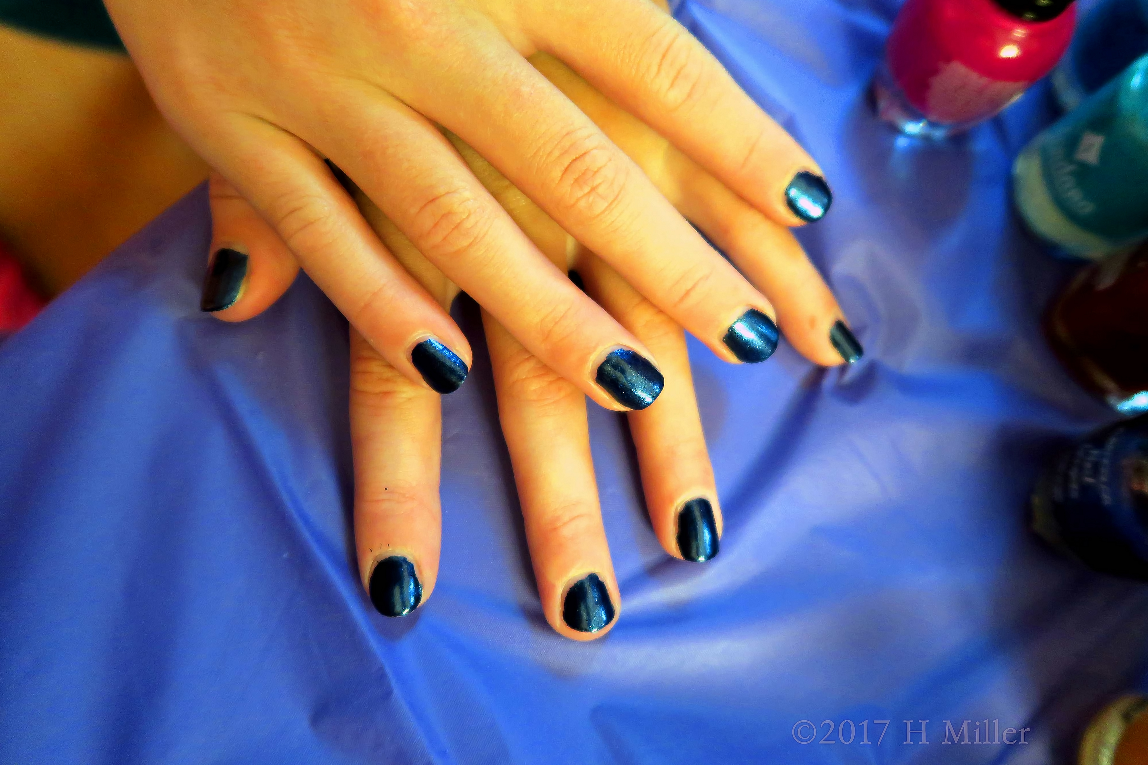 Chic Kids Manicure With A Metallic Sheen Chic Kids Manicure With A Metallic Sheen