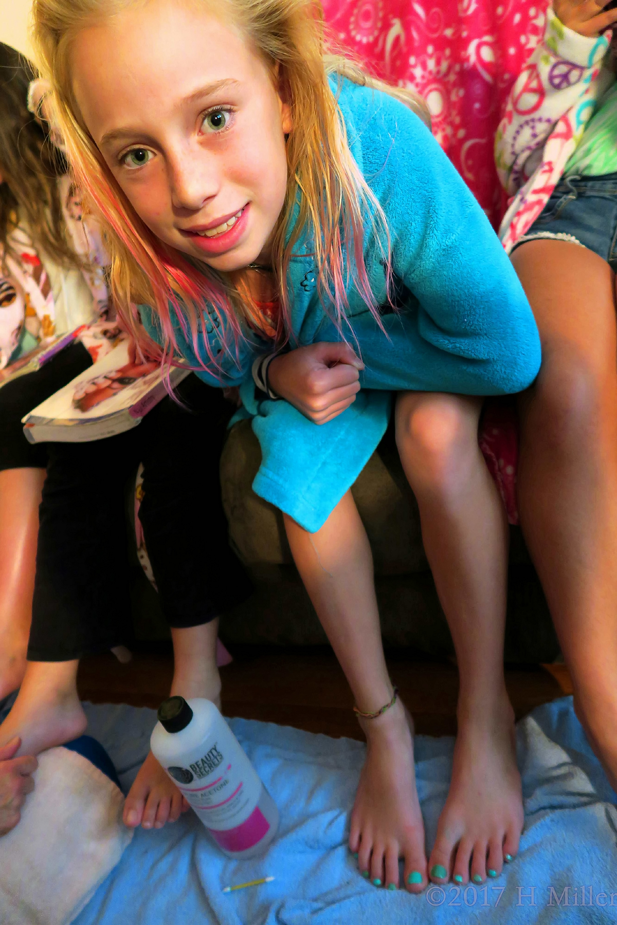 Posing With Her Lovely Turquoise Kids Pedicure! 