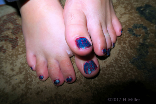 Beautiful Blue Shatter Kids Pedicure With A Pink Undertone.