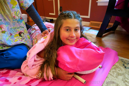 She Is Having A Blissed Out Time During The Relaxing Kids Massage. She Is Having A Blissed Out Time During The Relaxing Kids Massage.
