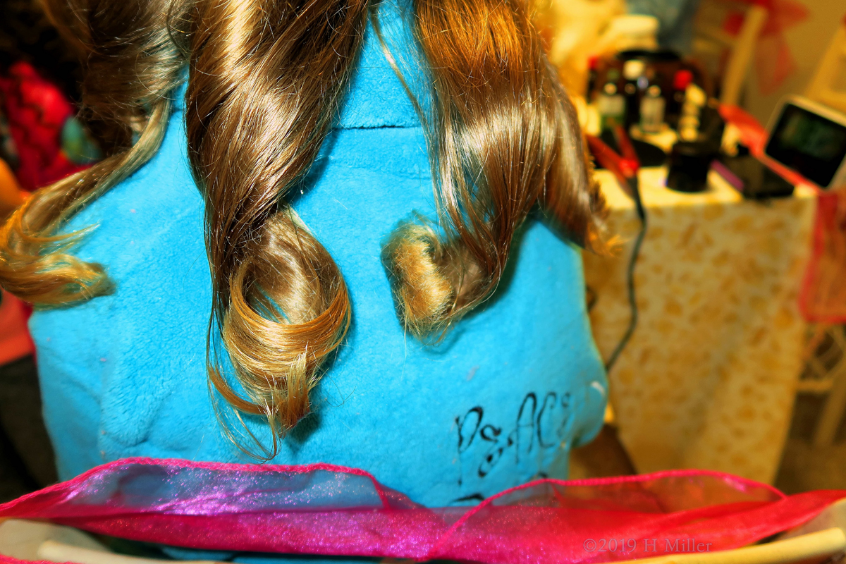 Curled Kids Hairstyle Closeup 