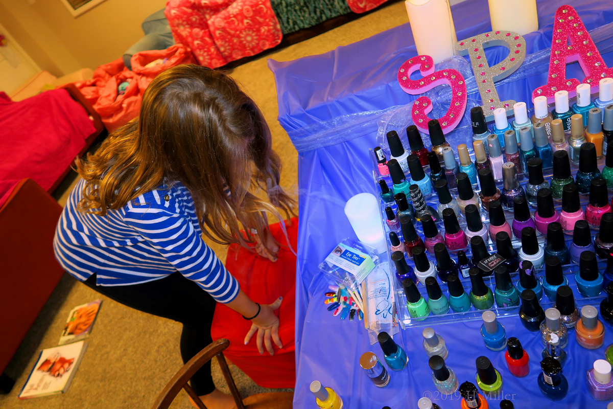 Looking At The Candles And Kids Manicure Colors 