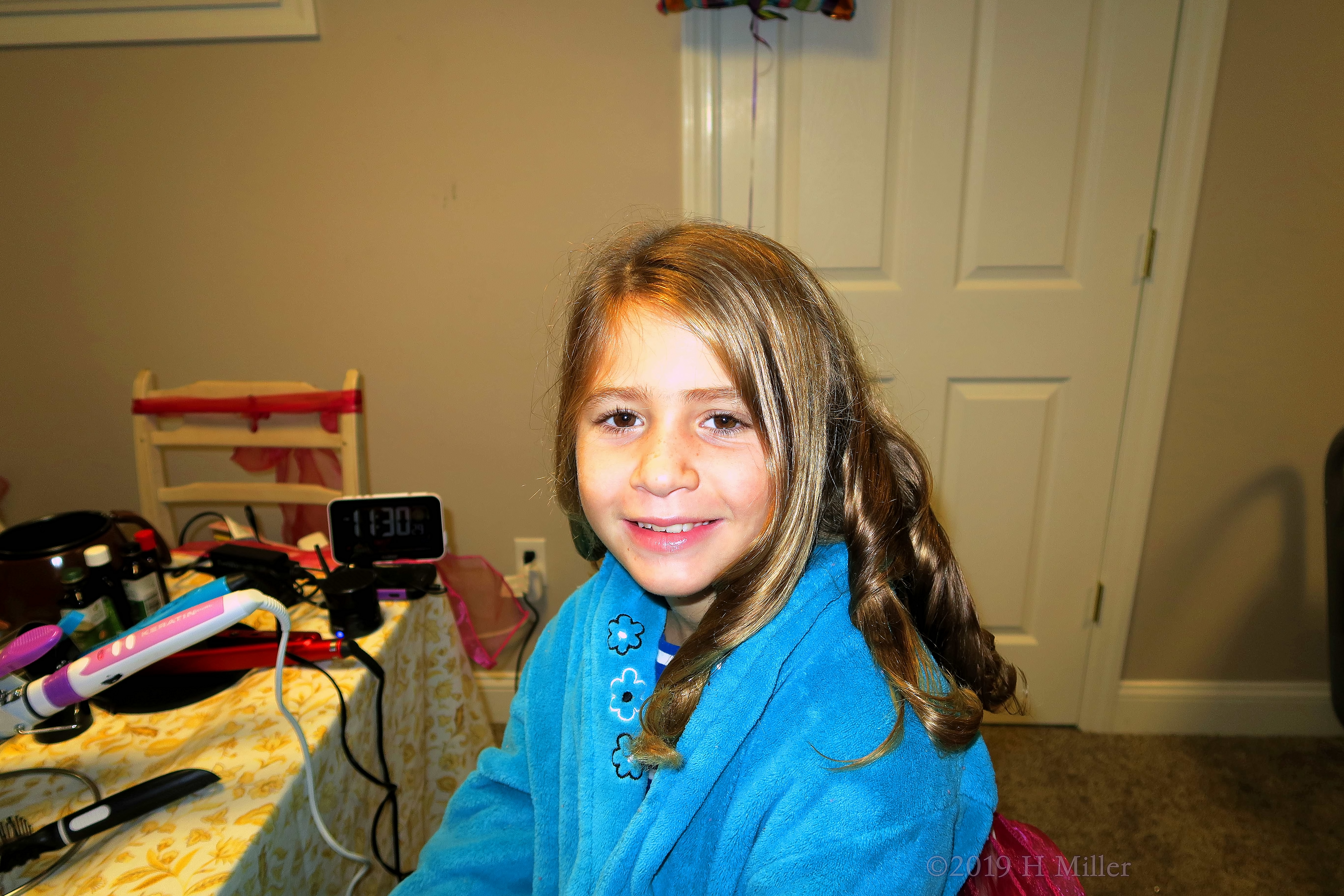 More Curls For This Girls Hairstyle, With The Party Guest Wearing A Peace Robe More Curls For This Girls Hairstyle, With The Party Guest Wearing A Peace Robe