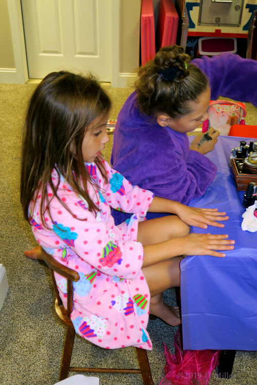 Everyone Waiting For A Turn At The Girls Hairstyling Table Everyone Waiting For A Turn At The Girls Hairstyling Table