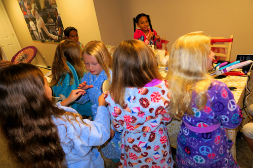 Pink Peace Robed Guest Getting Kids Hairstyle Done Pink Peace Robed Guest Getting Kids Hairstyle Done