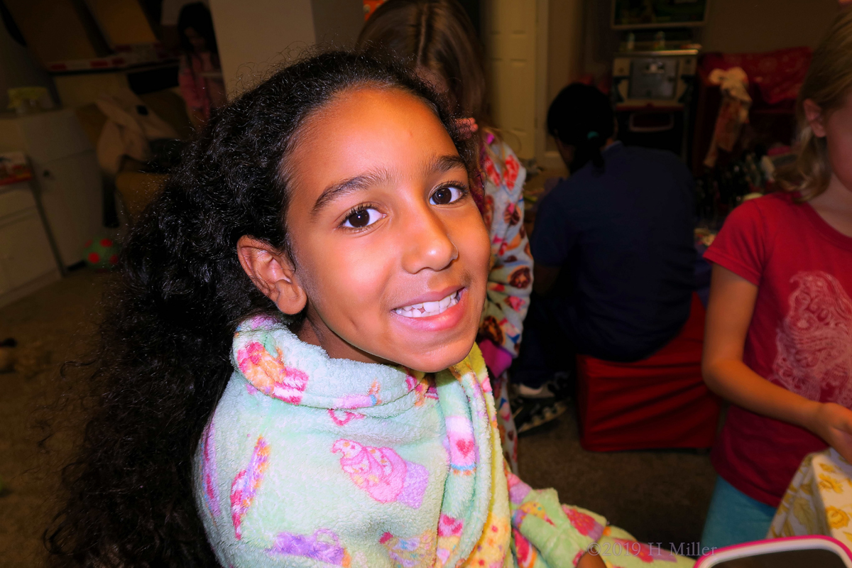 Cheerfully Cheeky! Kids Spa Party Guest Smiles For Camera!