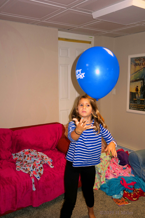Balancing Blue Birthday Balloons At The Kids Spa Party!