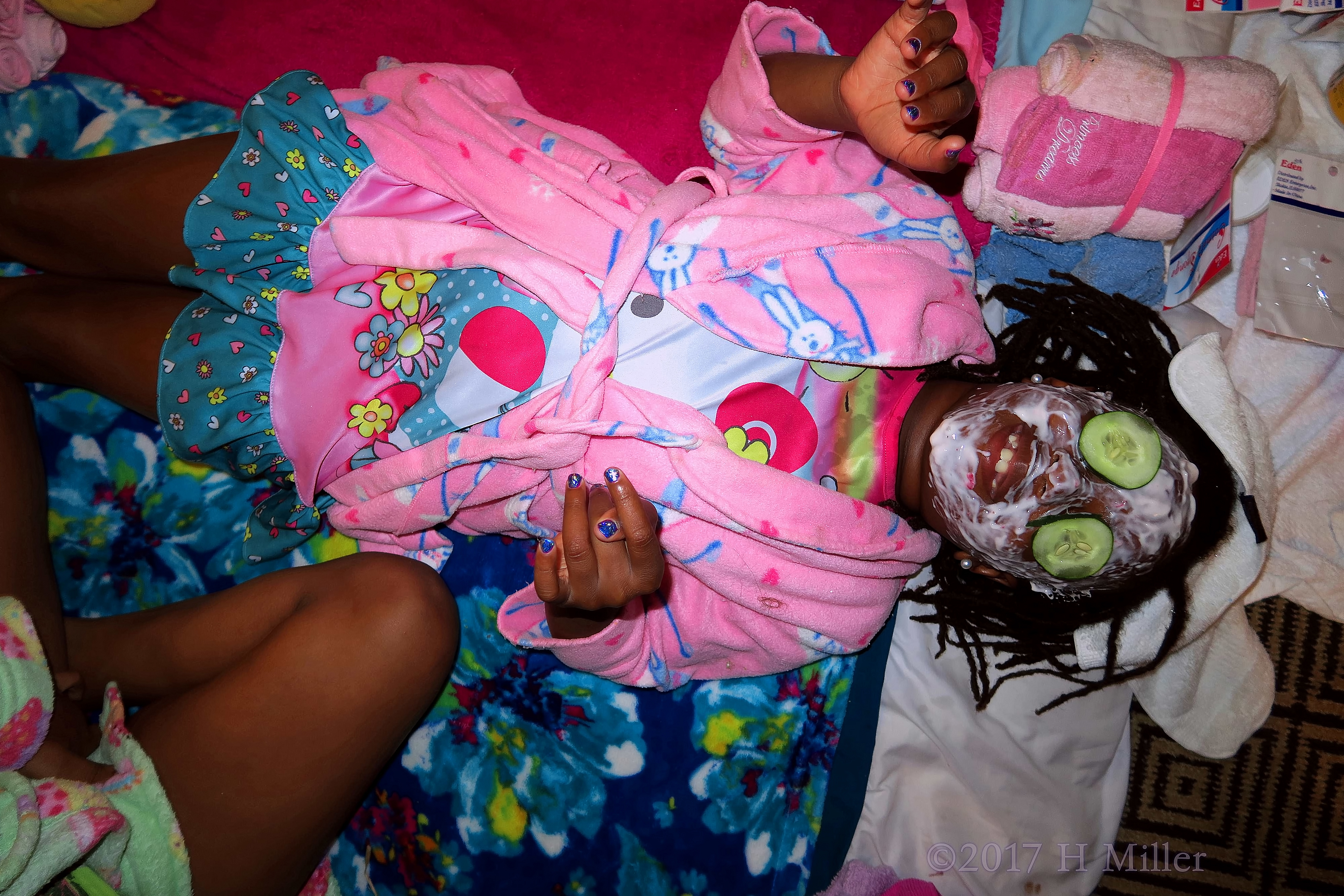 She's Having Fun Getting Her Girls Facial, Complete With Masque And Cukes On The Eyes. She's Having Fun Getting Her Girls Facial, Complete With Masque And Cukes On The Eyes.